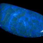 Opal (NMNH G8950) Opale bleu en toile d'araignée Lightning Ride, Australie  92.09cts Photo Chip Clark Source Smithsonian Institute